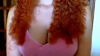 Curly-Haired Redhead With Big Breasts On Webcam