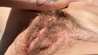 Homemade Video Of A Hairy Milf Sunbathing And Flaunting Her Outdoor Pussy