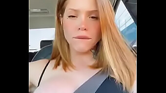 Redhead Teen Flaunts Big Tits While Operating A Vehicle