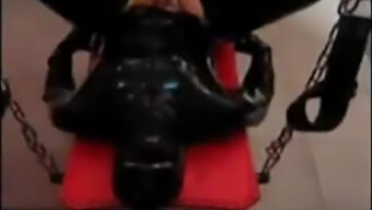 Mistress Dominates Her Latex Slave With A Strapon