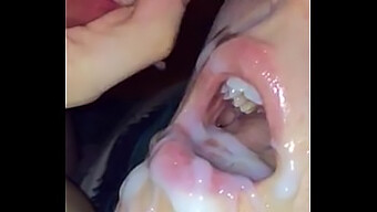 Slow-Motion Video Of A Young Woman Receiving A Large Load In Her Mouth