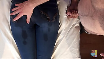 Close-Up Of Sensual Ass Massage In Denim Jeans With Lotion